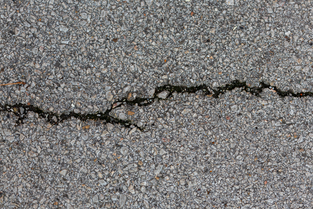 The Importance of Crack Sealing and Sealcoating for Long-Lasting Pavement