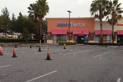 Aspen Dental's old & faded parking lot