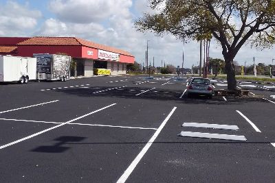 Newly sealcoated and striped parking lot