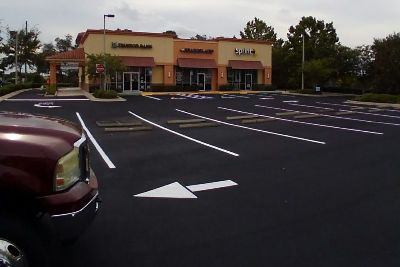 Newly sealcoated & striped parking lot