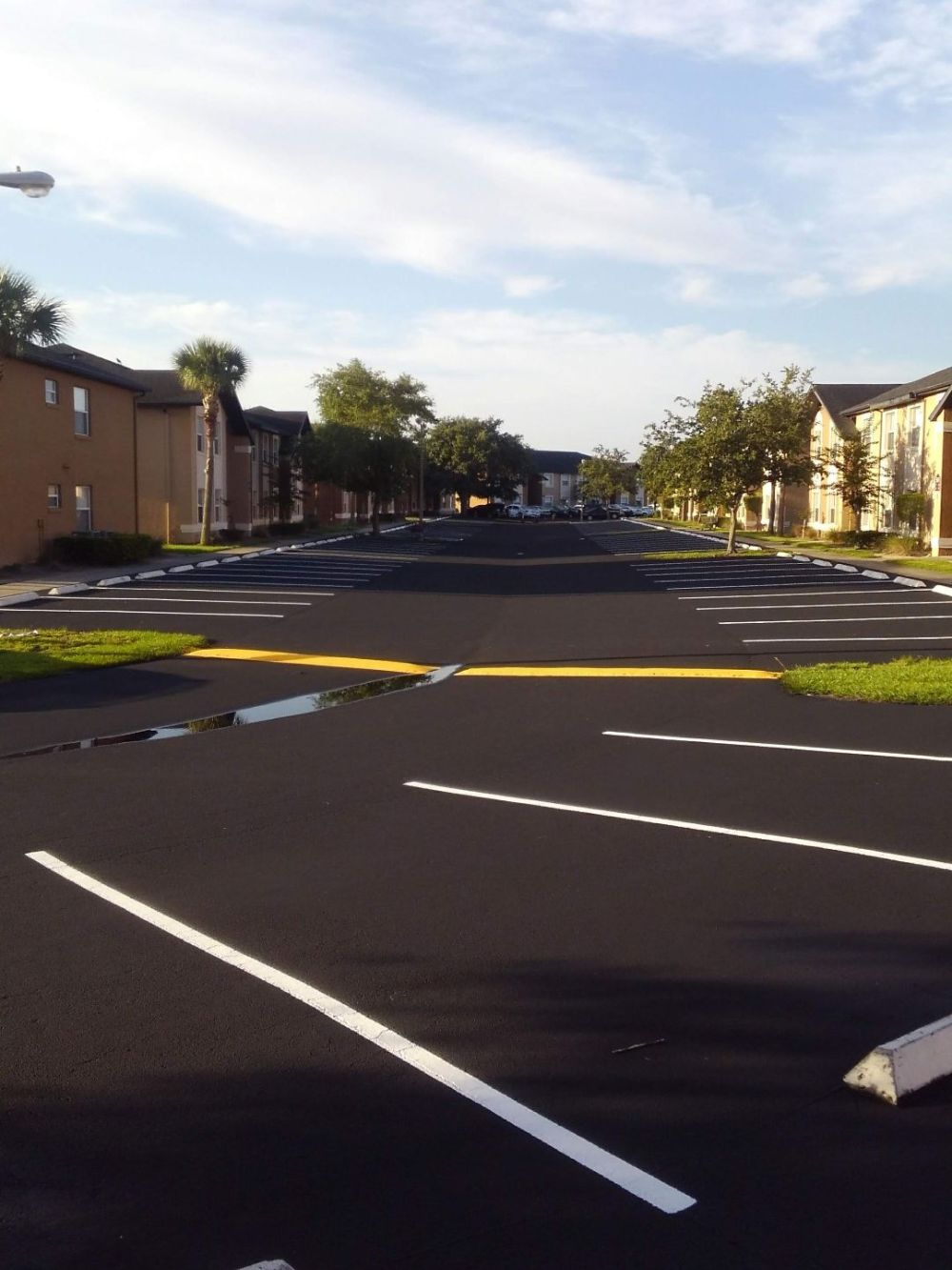 Residential parking lot sealcoating & striping